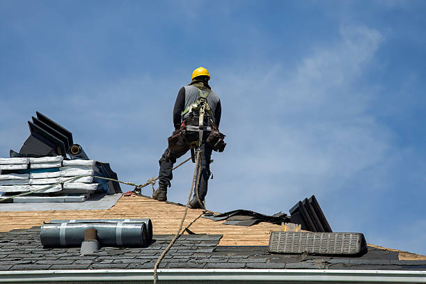 Professional Roofing technician working in West Warwick, RI